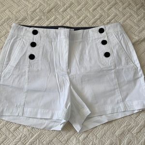 White with blue buttons. Red with blue buttons. Peach/ Pink with blue buttons.